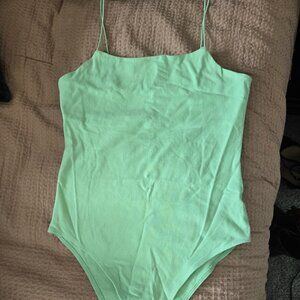 Size small light green bodysuit